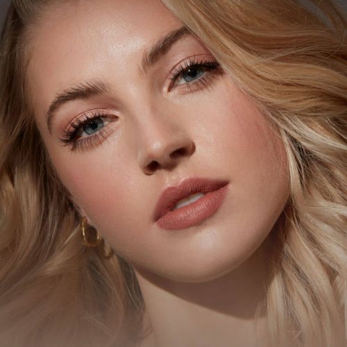 sunkissed blonde model with natural spring pink bridal makeup