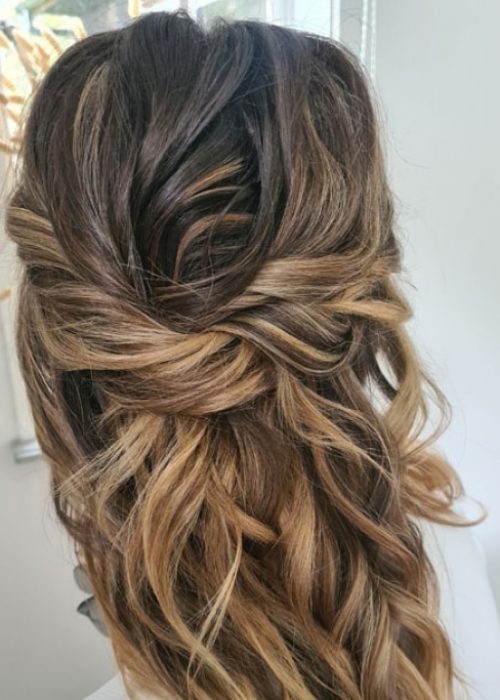 boho bridal half up hair down hairstyle with texture and twists natural bridal makeup and hair stylist